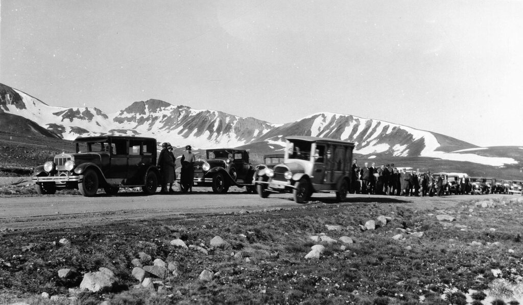 One b/w photograph of the escort for the body of D.R.C. Brown, Sr. at the top of Independence Pass at 6:30am on July 1, 1930. The body was brought from Denver to Aspen for interment.