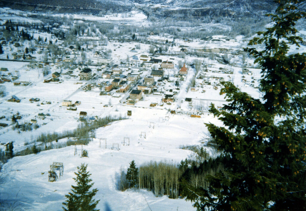 One color photograph of Aspen and the Little Nell, taken in 1953 from Aspen Mountain.