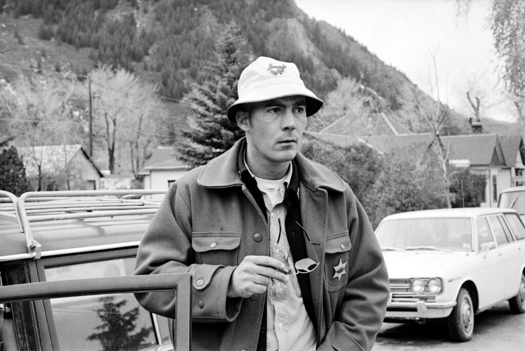 One b/w film negative of Hunter Thompson, October 1970 wearing a sheriffs badge as part of the campaign for Sheriff.
