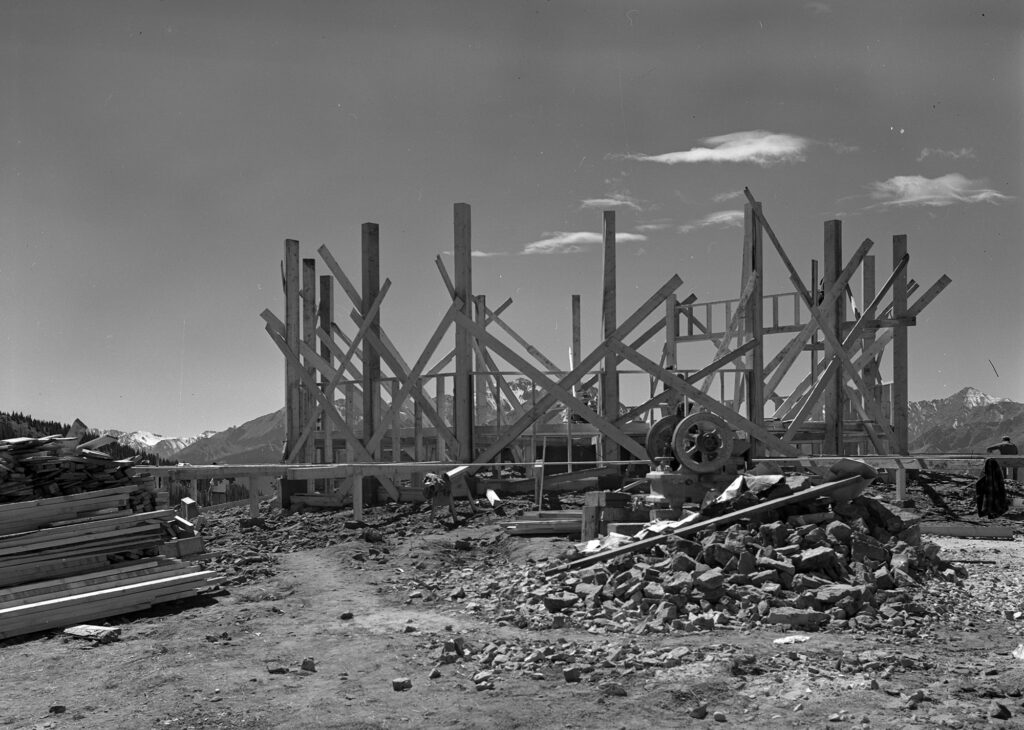 One b/w negative of construction of the Sundeck, summer 1946. Only the bottom floor, wooden wall supports and some deck framing are in place.