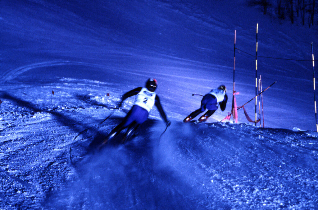 One color slide of competitors in the 24 Hours of Aspen endurance race on Aspen Mountain, December 14, 1996.
